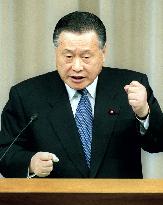 Mori says resigning to regain public trust in politics
